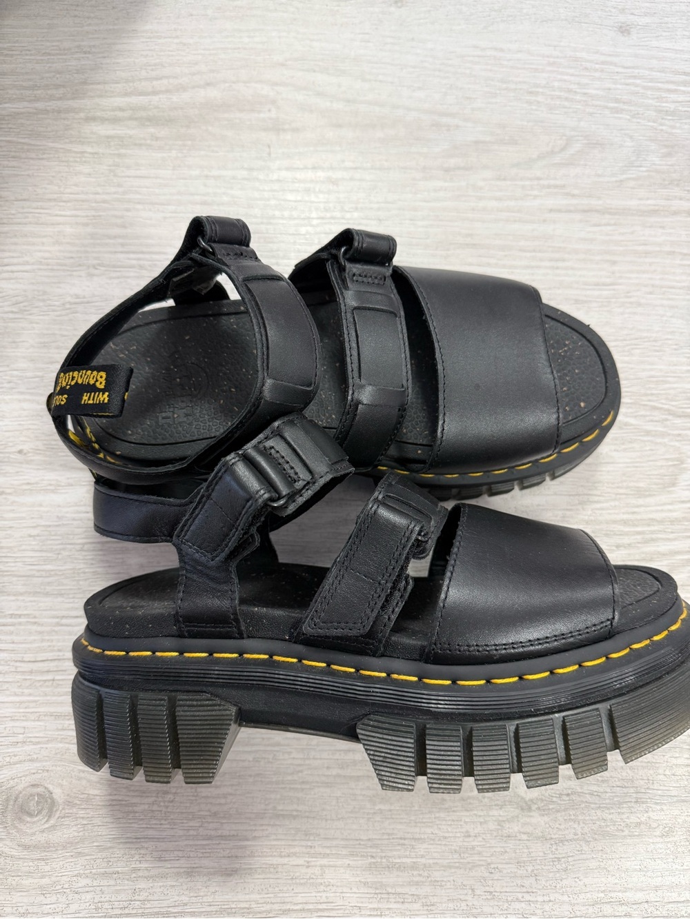 Dr. Martens Black Leather 3-Strap Sandals with Yellow Stitching